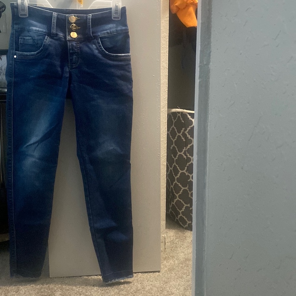 Selling dark color jeans . Size: Small/medium